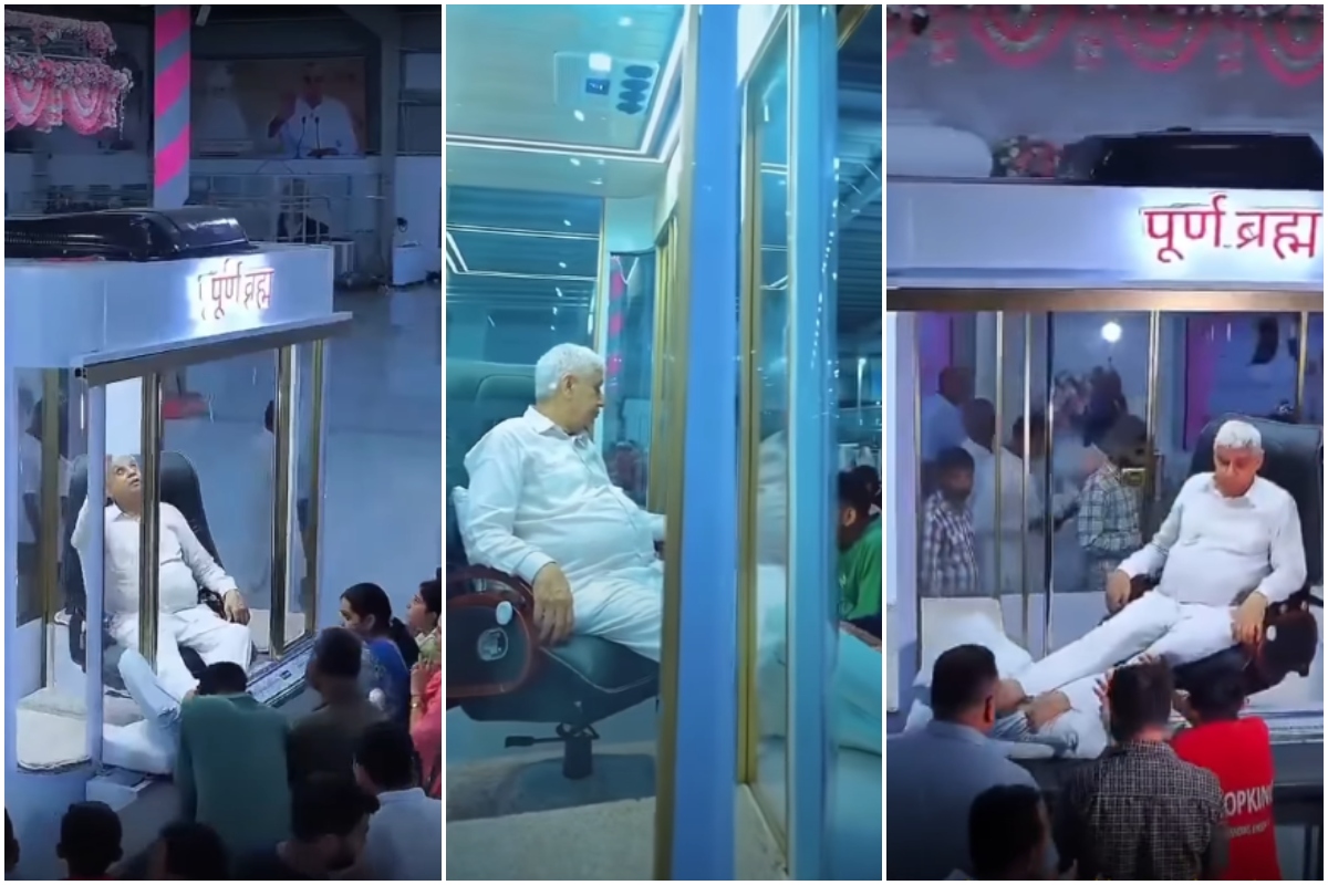 Imagini virale! Un guru indian își primește adepții dintr-o cabină cu aer condiționat și pereți din sticlă, în timp ce aceștia îi sărută picioarele. VIDEO